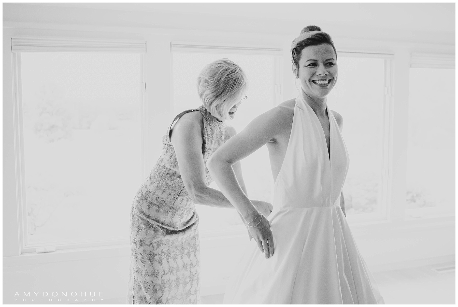 Getting into the dress | Basin Harbor Wedding Photographer | © Amy Donohue Photography