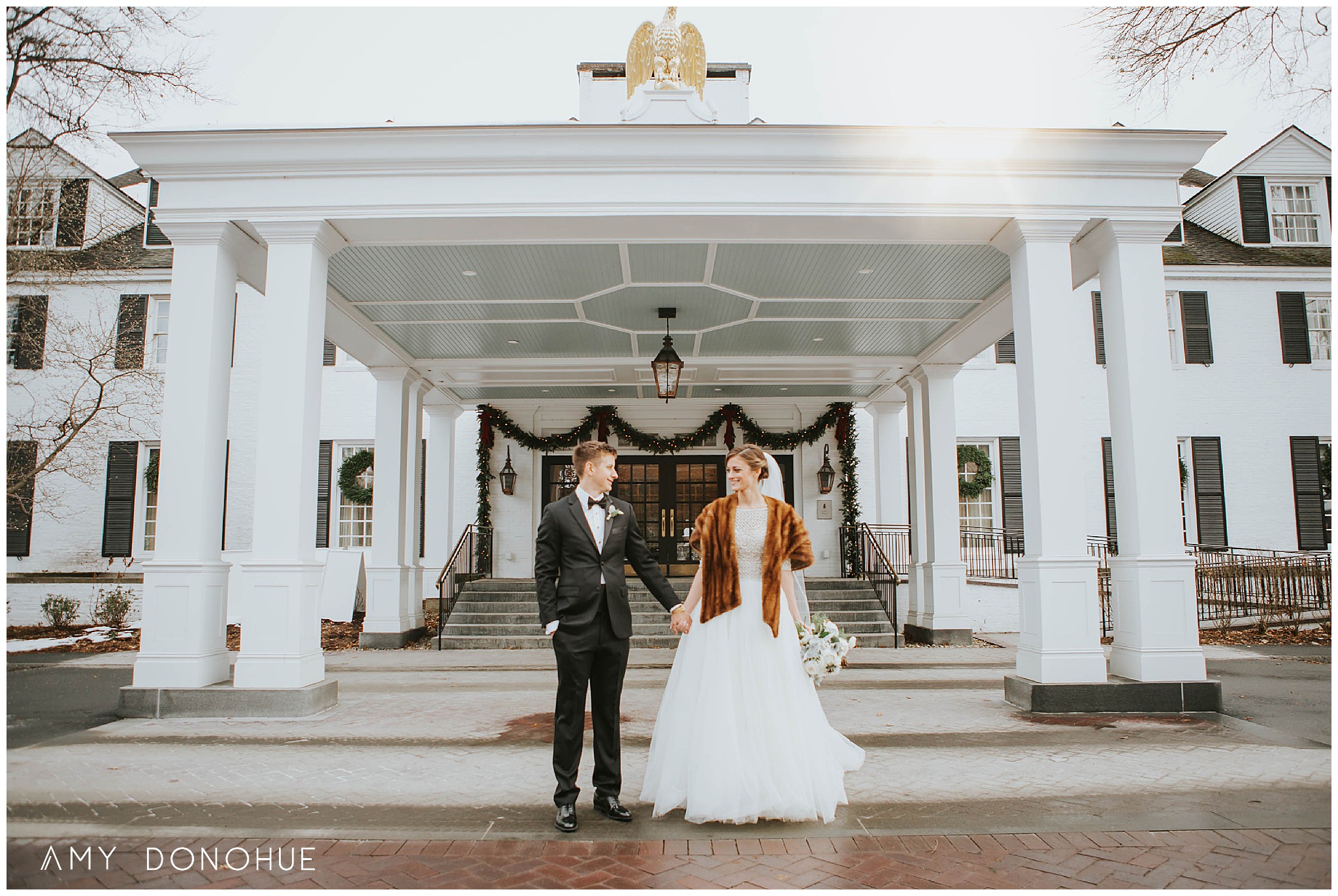 Bride and Groom portraits in front of the Woodstock Inn and Resort