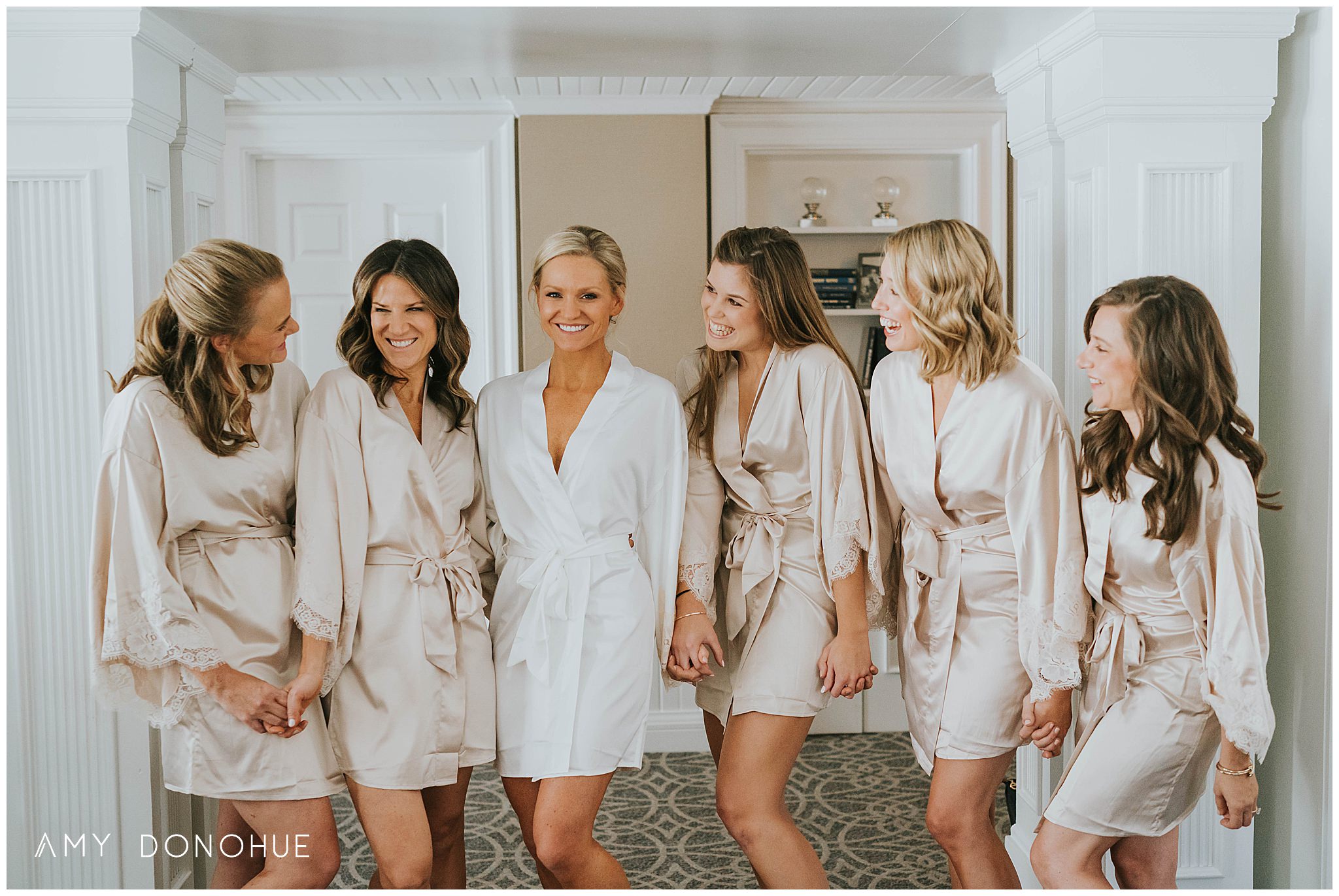 Bride and bridesmaids in matching robes at the Equinox Resort Wedding | Vermont Wedding Photographer | © Amy Donohue Photography